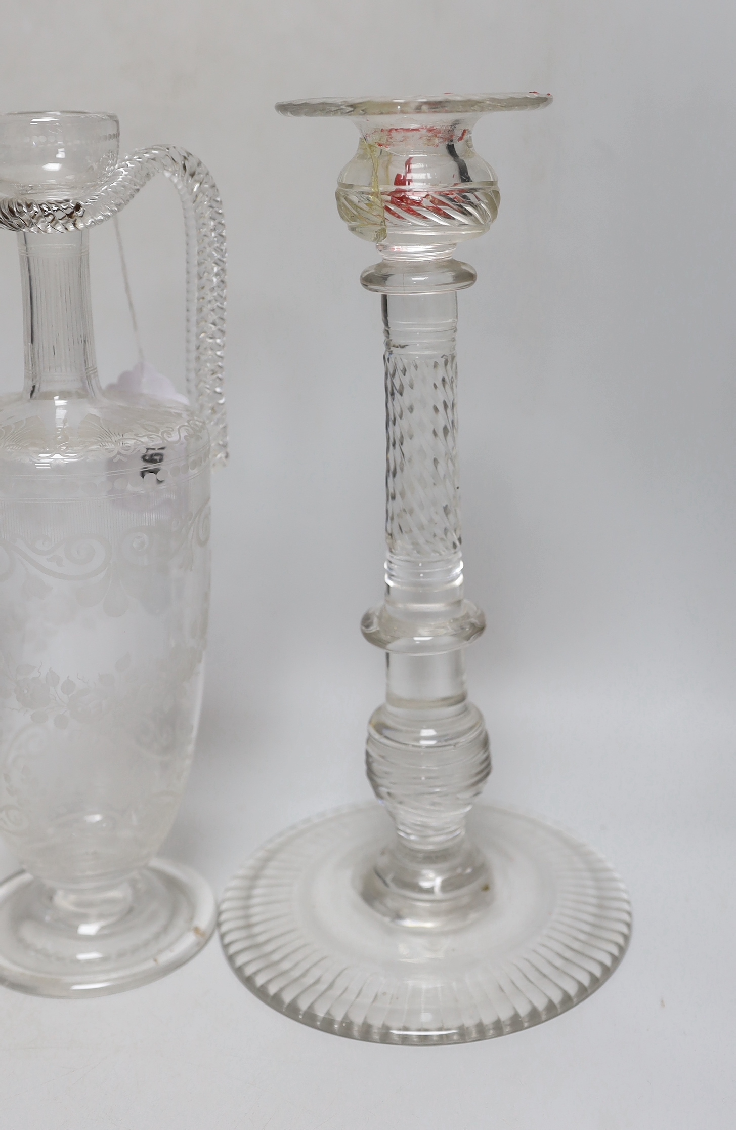 A group of 19th century and later glassware including an Edwardian decanter with floral etched decoration and a pair of glass candlesticks, the largest 29cm high